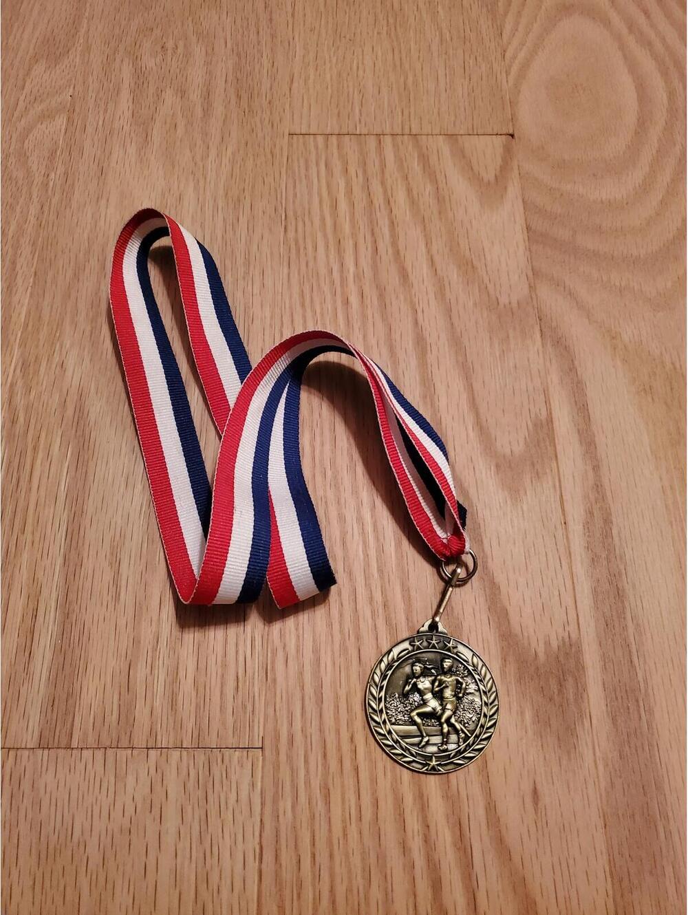 Gold-Tone Running Medal with Red, White, and Blue Ribbon